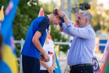 Olympiádu dětí a mládeže letos hostí Jihočeský kraj. Podívejte se na pondělní medailový ceremoniál prostřednictvím fotografií Václava Pancera.